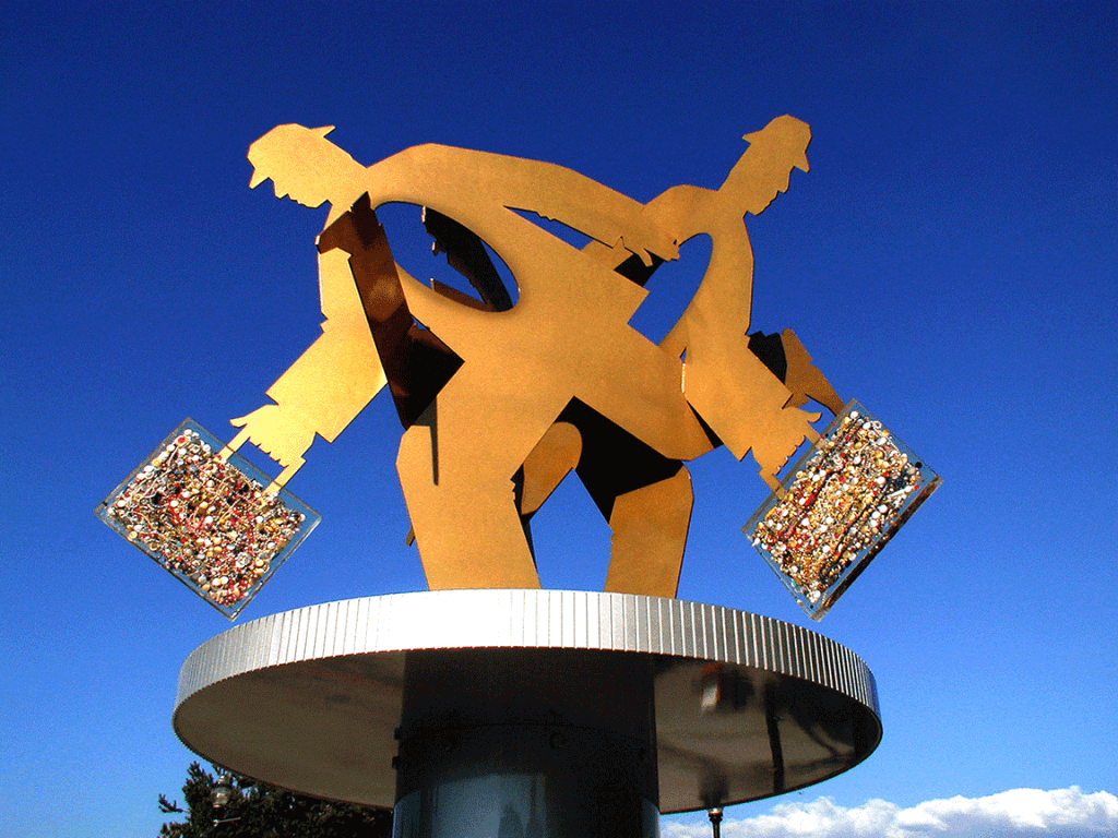 16' steel & resin sculpture called Running Man, installed in Kelowna BC