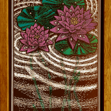 Print of Pink Lily Pads in a pond with dark brown water. Stained brown wood frame.